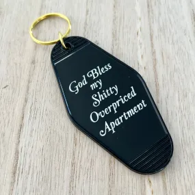 Motel Keychain - God Bless My Sh*tty Overpriced Apartment - Black