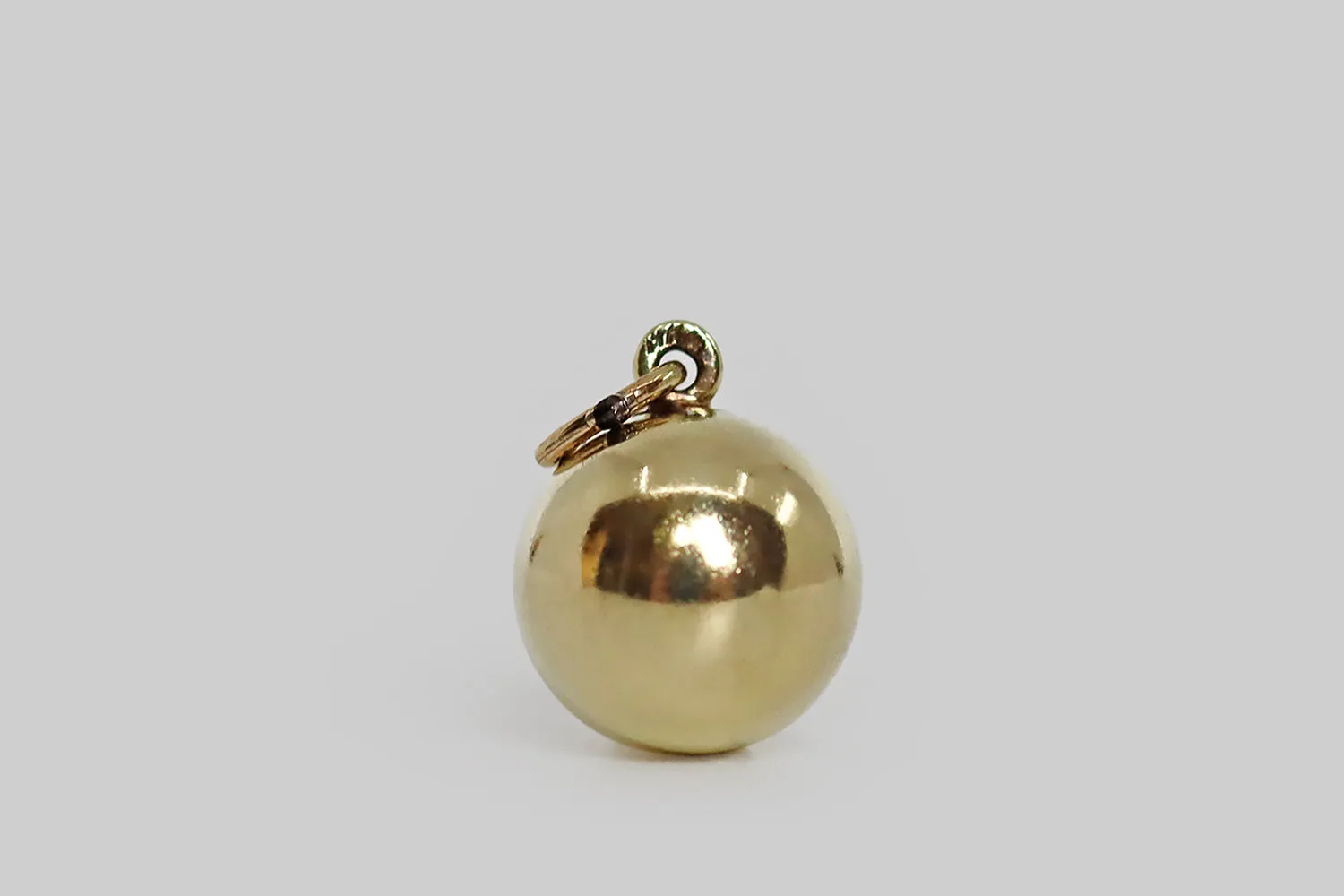 Sloan & Co. 1930s Miniature Eight Ball Enamel Charm in 14k Gold